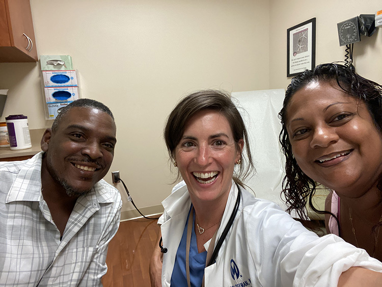 From left, Larry Parker, Dr. Ciara Freeman and Chandra Parker take a selfie at a recent appointment at Moffitt.