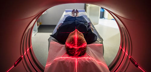 A person getting a CT scan