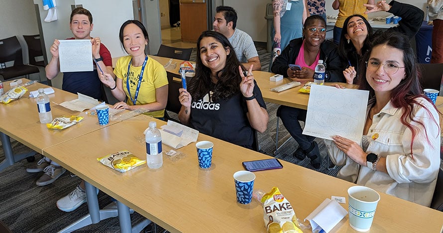 grad students celebrate during a luncheon