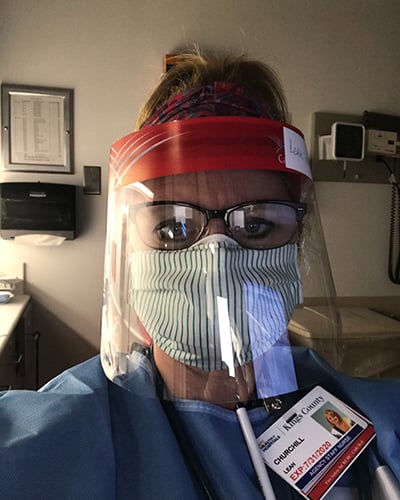 Churchill in full protective equipment while caring for COVID-19 patients