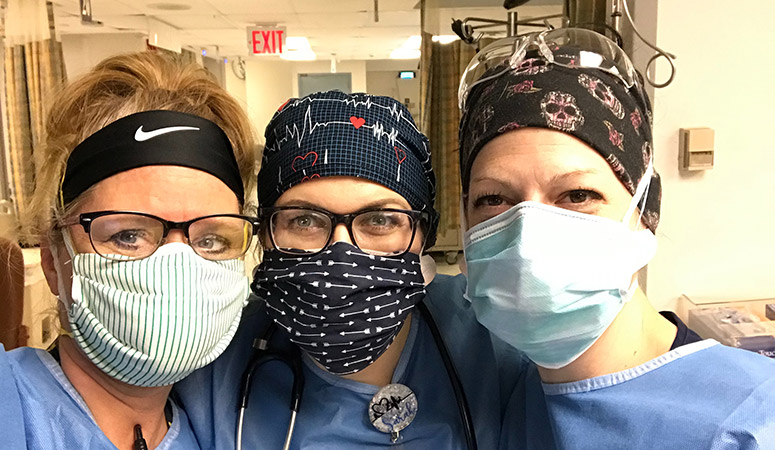 Churchill (left) with two other nurses working at Kings County Hospital during the COVID-19 pandemic