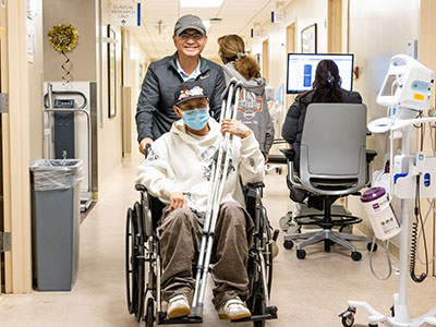 Raphael Misael, pictured with dad Alan, is facing life-changing choices at the young age of 28 after being diagnosed with osteosarcoma. His story is one that oncologists are seeing more frequently as cancer cases rise among young adults.