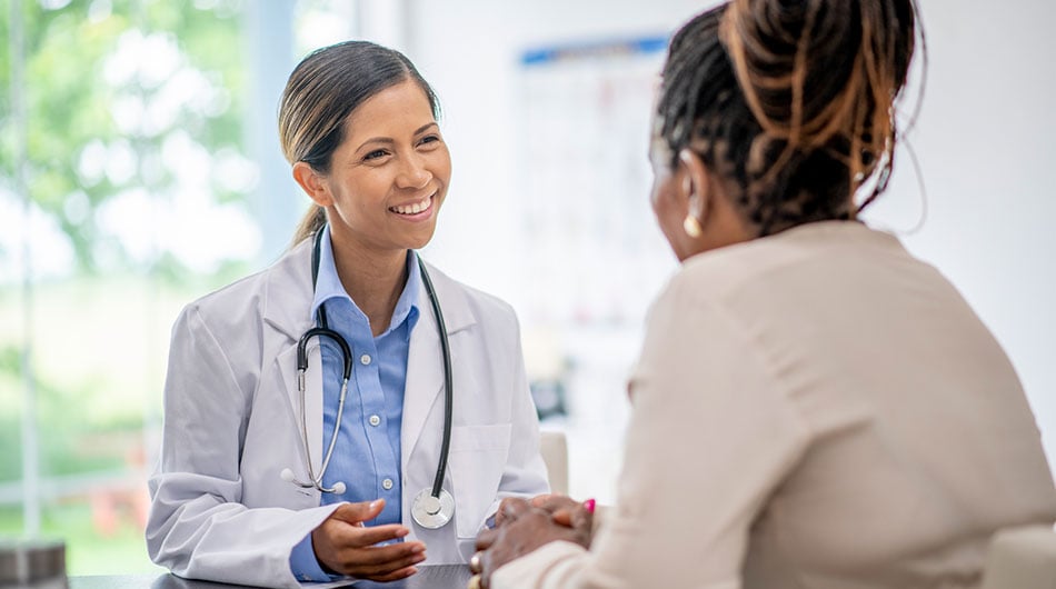 patient discussing hysterectomy options with doctor