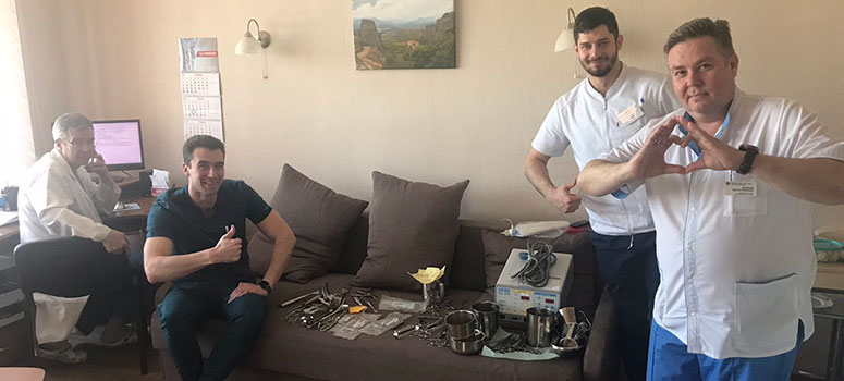 Staff in Zaporizhzhia pose with donated supplies.