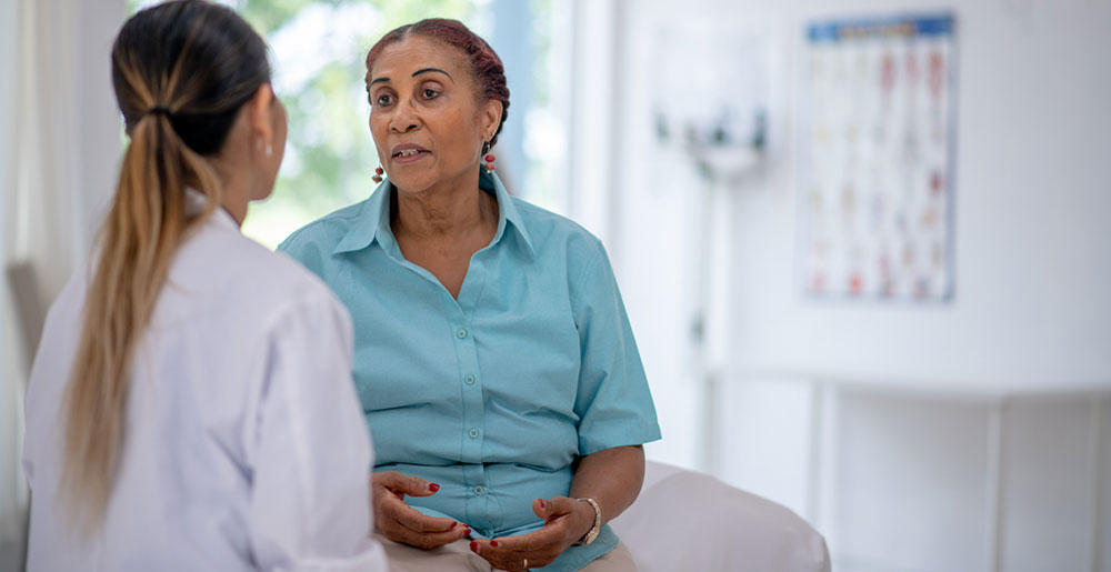 Patient discussing pancreatic cancer vaccines with doctor