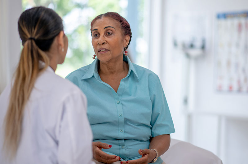 Patient discussing pancreatic cancer vaccine with doctor