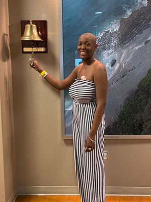 Kerrijo Ellis rings the bell at Moffitt to commemorate her final chemo treatment.