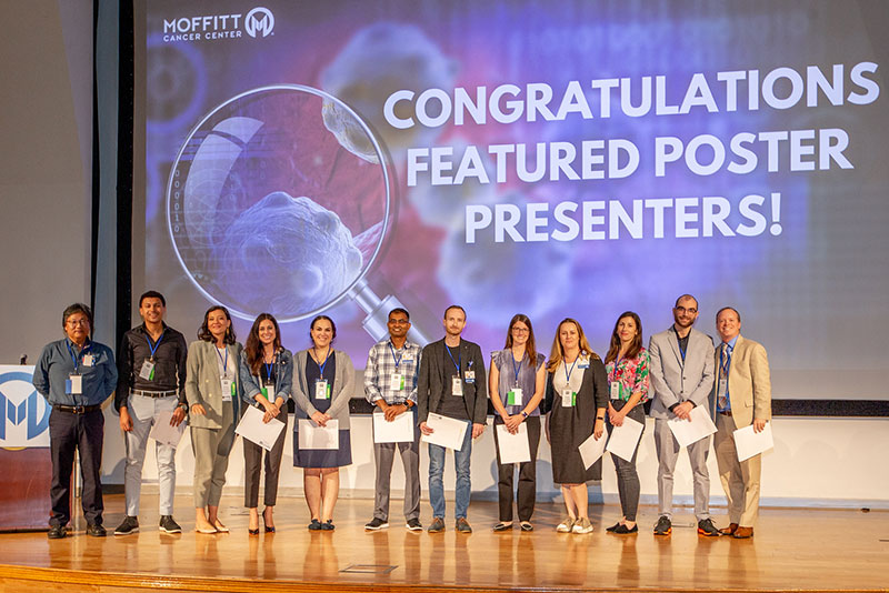 Poster presenters at the Moffitt Scientific Symposium