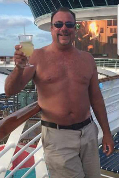 Cella went on a cruise a month before his diagnosis. He says looking back at the photographs, he can see his tumor.