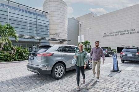 couple arrive at Moffitt