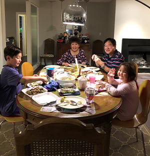 Dr. Catherine Lee's parents share some time with her two children.