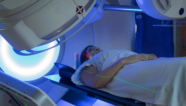 A woman receiving accelerated partial breast irradiation