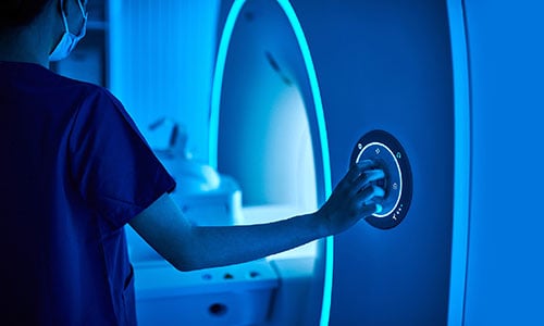 nurse at MRI machine