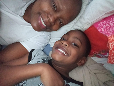 Photo of Misha Jones and her son