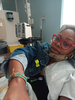 photo of Misha Jones receiving cancer treatment
