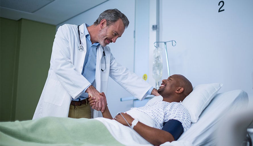Doctor meeting patient with colon cancer