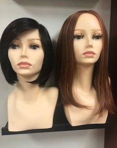 examples of wigs, a short dark style and the other long red