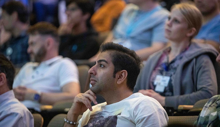 Audience member listens during the Ted Couch lecture