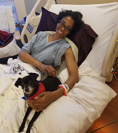 Christensen poses after an operation in 2018.