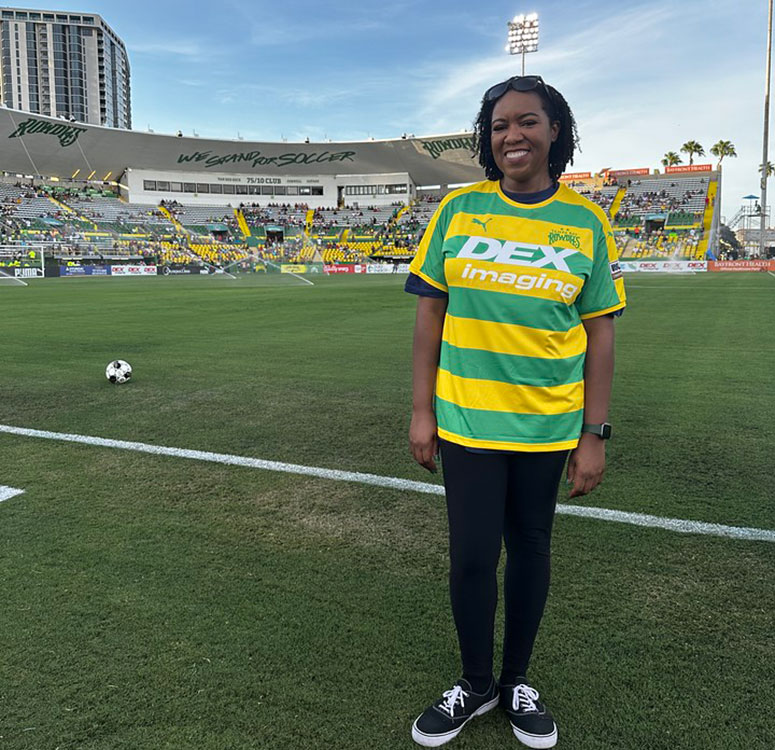 Moffitt nurse Leila Wilson was the honorary coin toss captain.