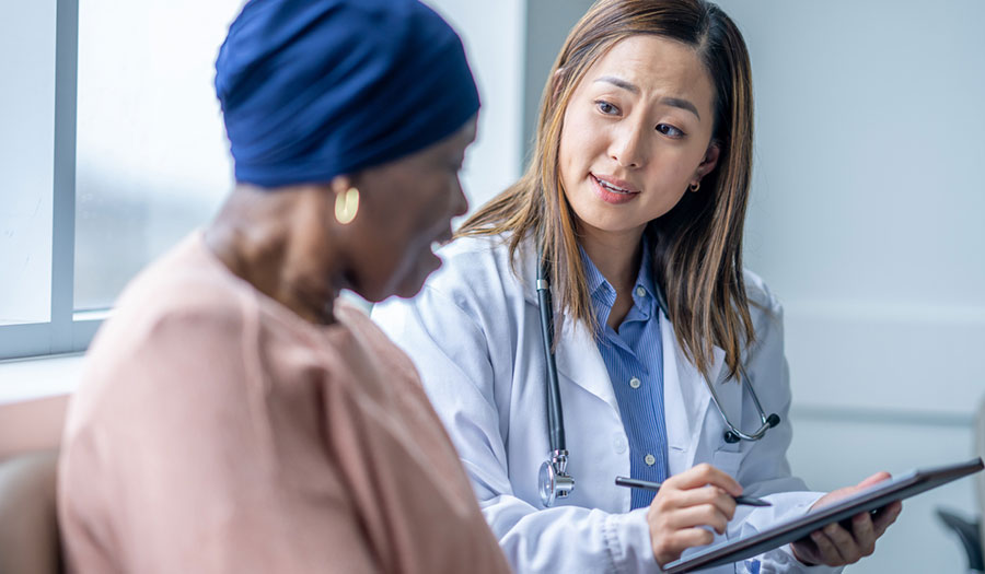 Doctor describes pancreatic cancer immunotherapy with patient