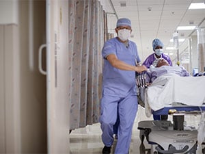 colorectal cancer patient entering surgical room