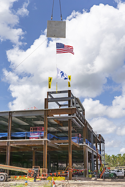 The proton therapy unit is expected to open in mid-2026.