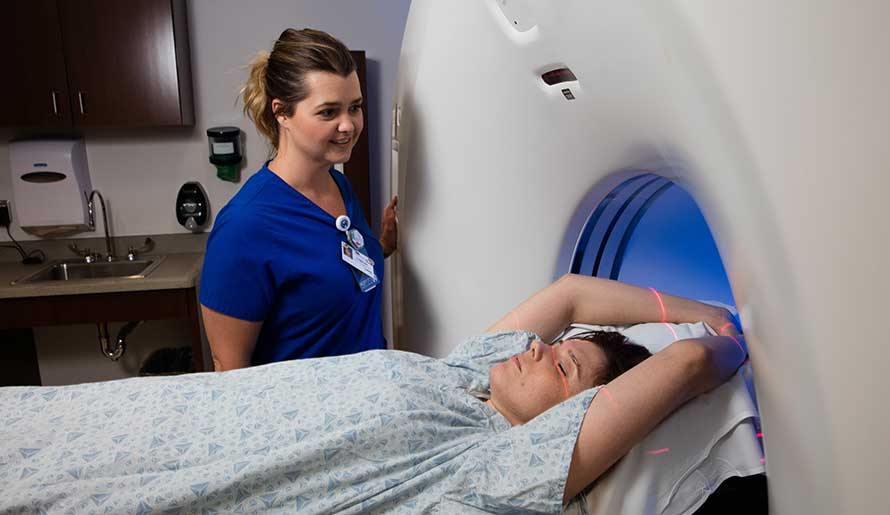 A woman getting a PET Scan