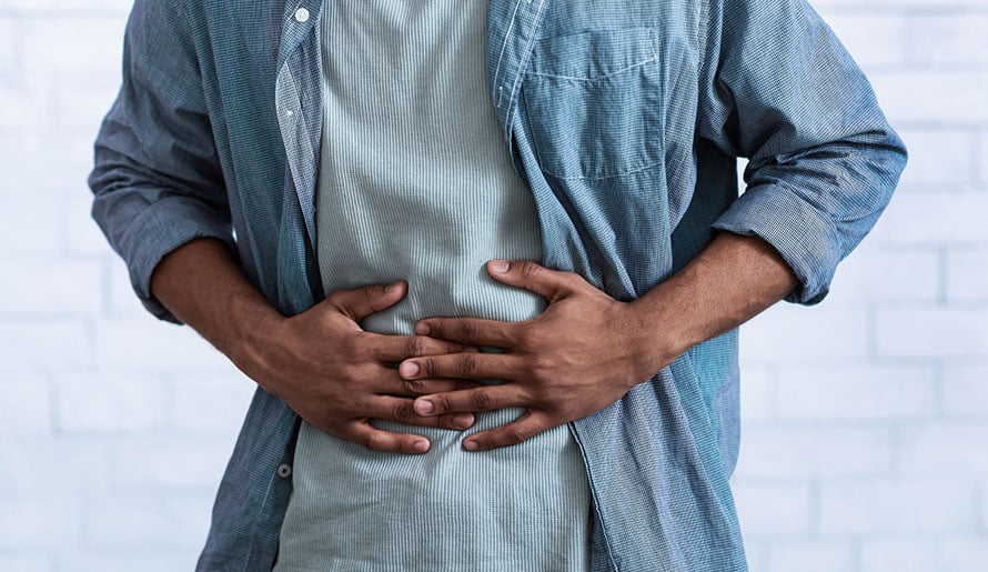 male with stomach pain