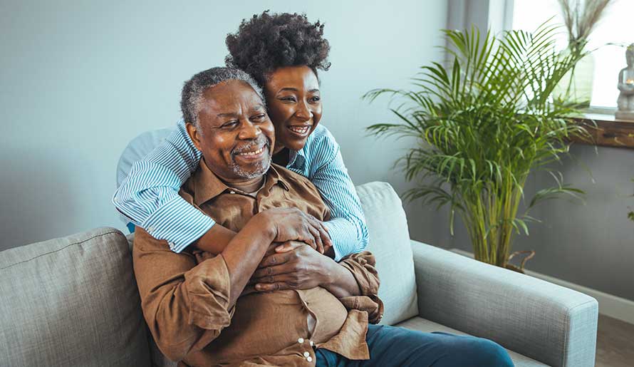 A daughter hugging her dad