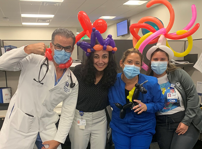 Members of Moffitt's Cutaneous Oncology team get in on the fun of pediatric melanoma clinic day.