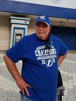 Breast cancer survivor Bob Zvonchenko attends a Tampa Bay Lightning game