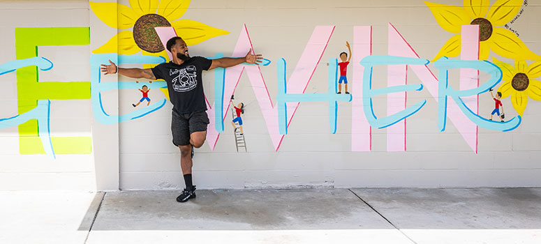 Jarryd Reid works as the Student Success Coach at Sligh Middle Magnet School.