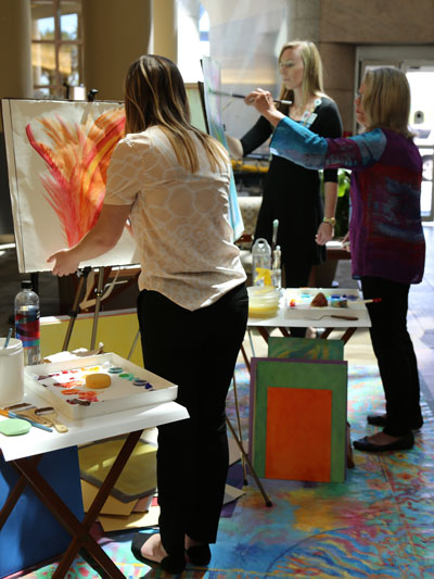 Artists paint in the Red Lobby during the 2017 Color of Music.
