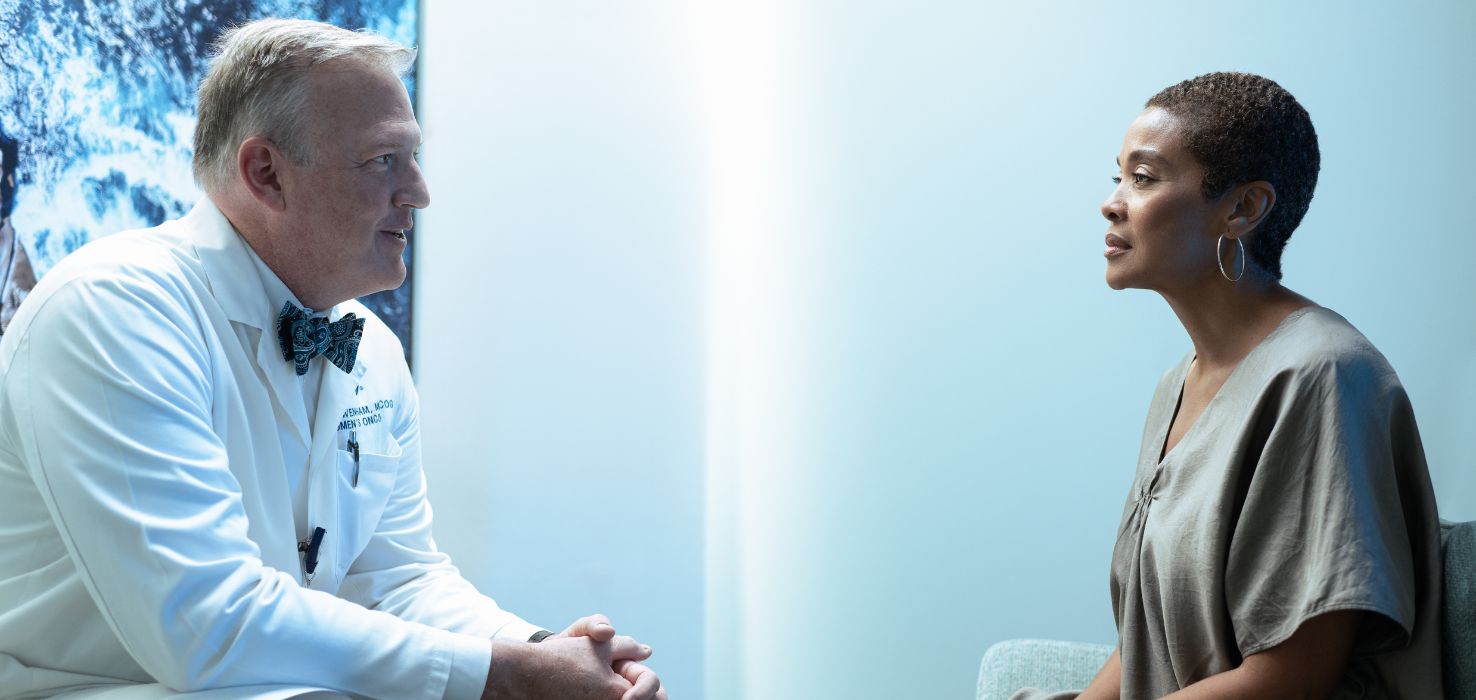 Physician and doctor talk together.