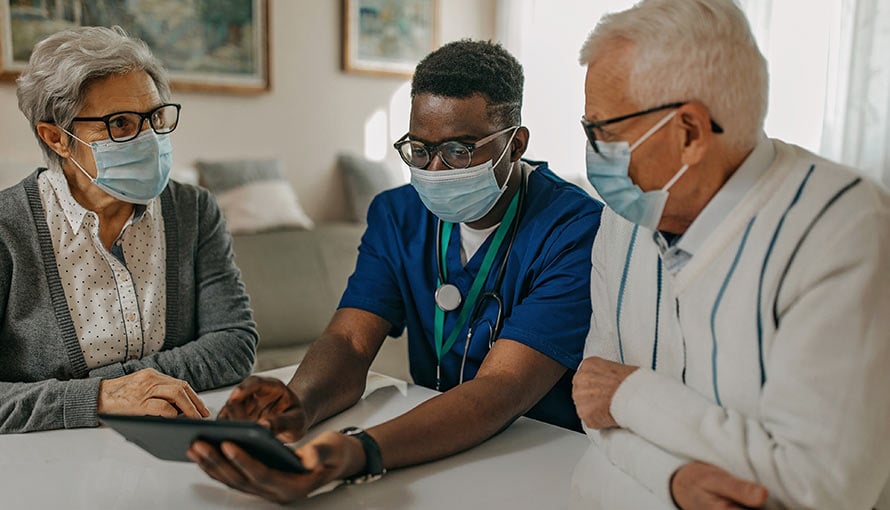 A couple talk to a doctor