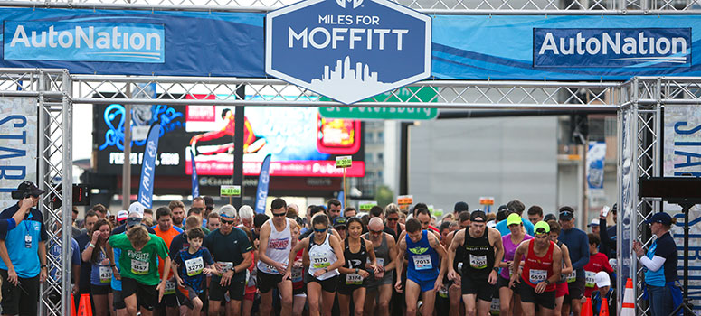 Runners line up at the starting gate at the 2018 Miles for Moffitt race.