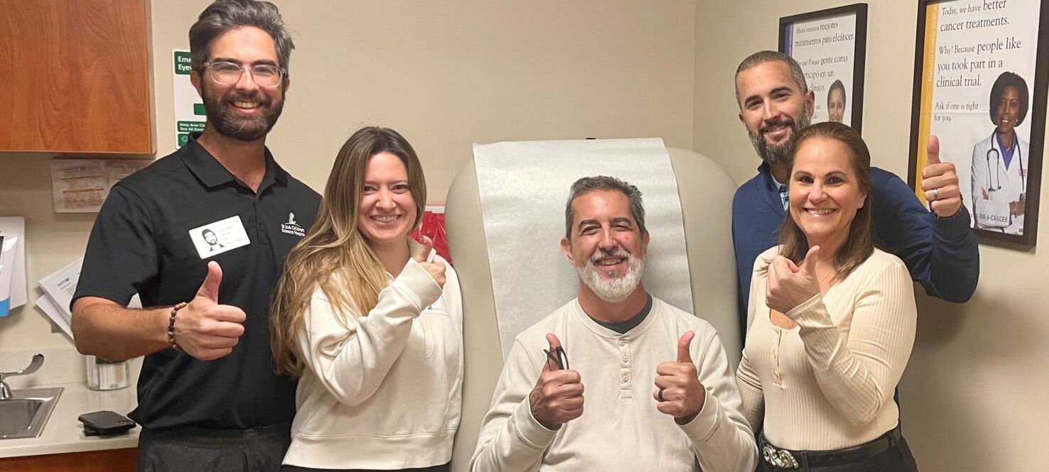 patient giving a thumbs up