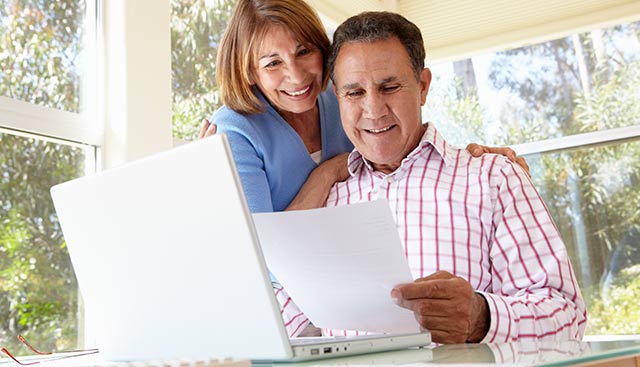 couple looking at financial papers
