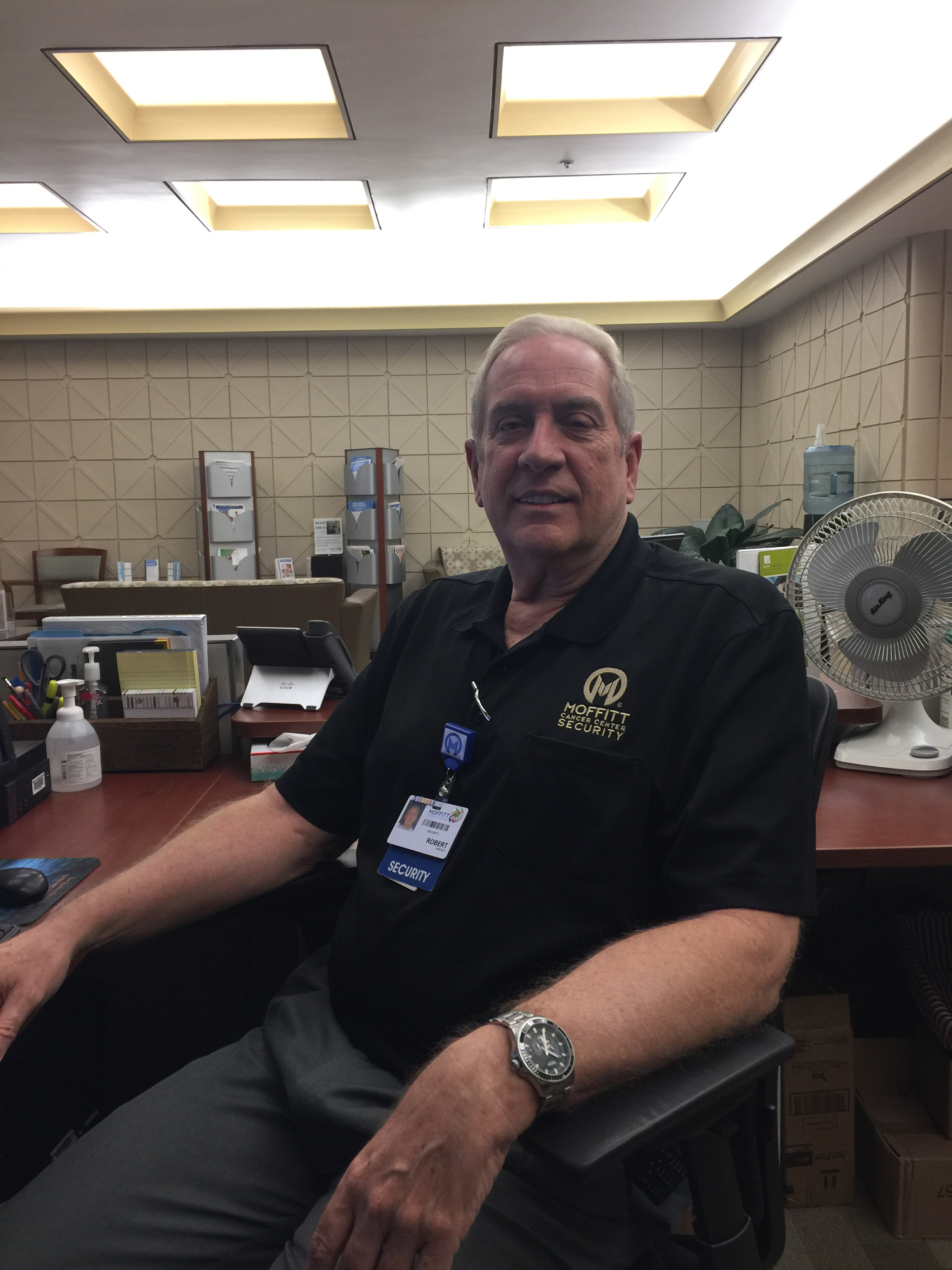 Photo of Robert Huntley sitting at a desk
