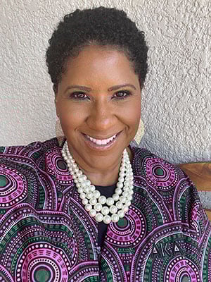 Headshot of Tracy-ann Suleiman, co-chair of community service for the Gamma Theta Omega Chapter