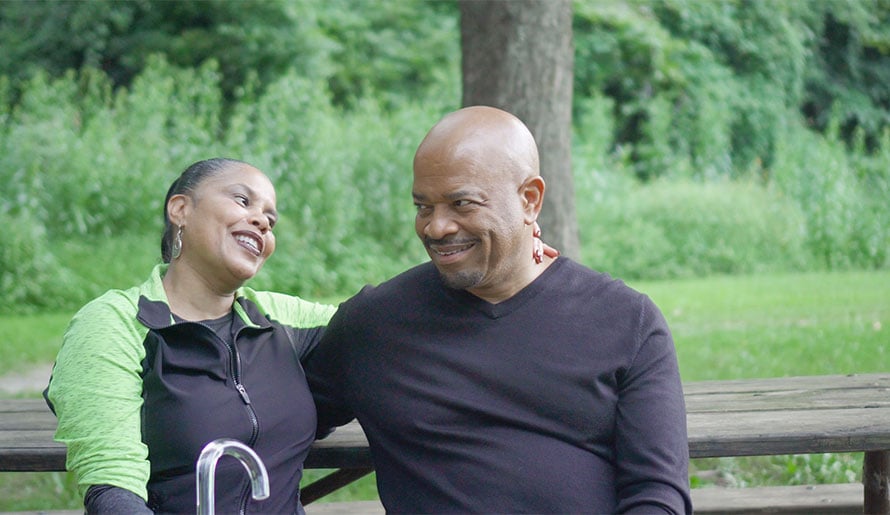 prostate cancer survivor with spouse at park