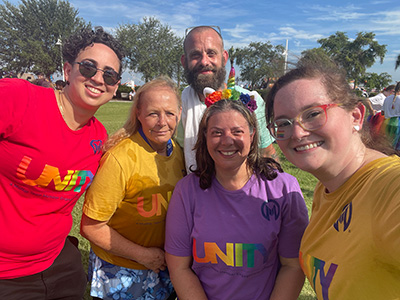 Laura Bosselman, right, joins UNITY members for the St. Pete Pride parade.