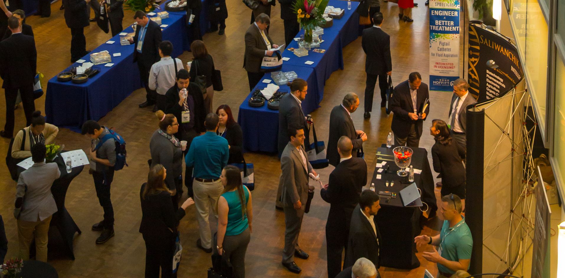 Conference attendees mingling.