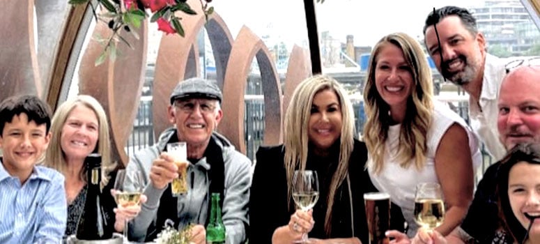 Kevin Ogden (third from left) enjoys dinner with his wife, daughters and grandchildren in London.