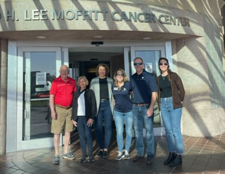 Leaping Love donors include, from left, John and Doris Bernard, Alicia Tanner, Vanessa and Tim Bernard, and Lis Galindo, who contributed to the gift boxes for Moffitt patients.