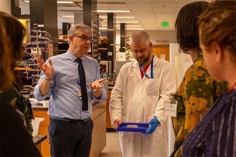 Dr. Alvaro Monteiro giving a lab tour