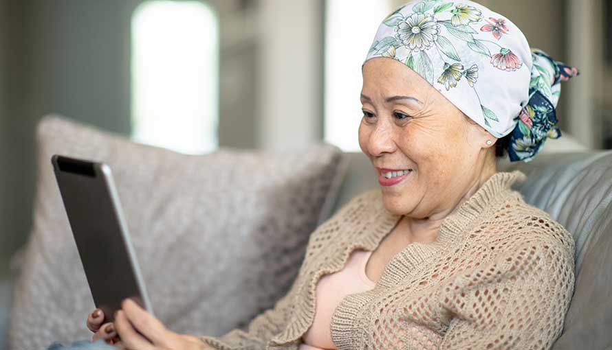 Patient interacting with family on tablet