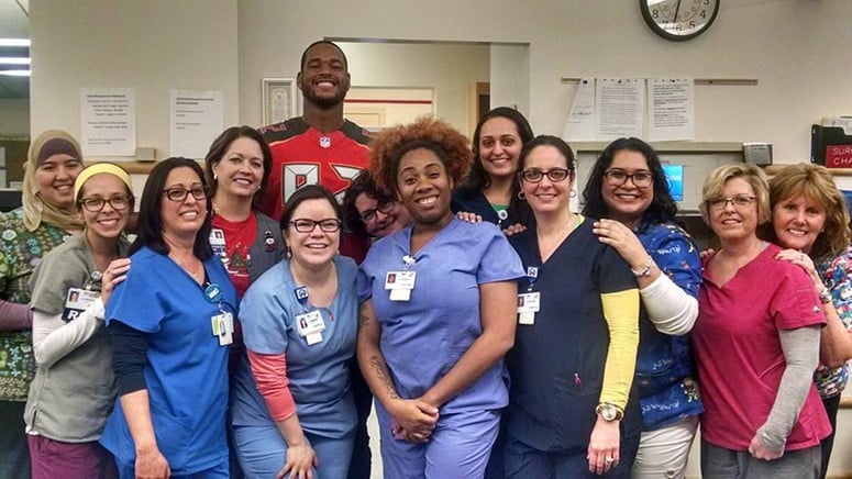 William Gholston, pictured with Moffitt team members