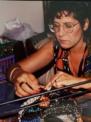 Valerie Romero bejewels radiation mask in memory of friends she has lost